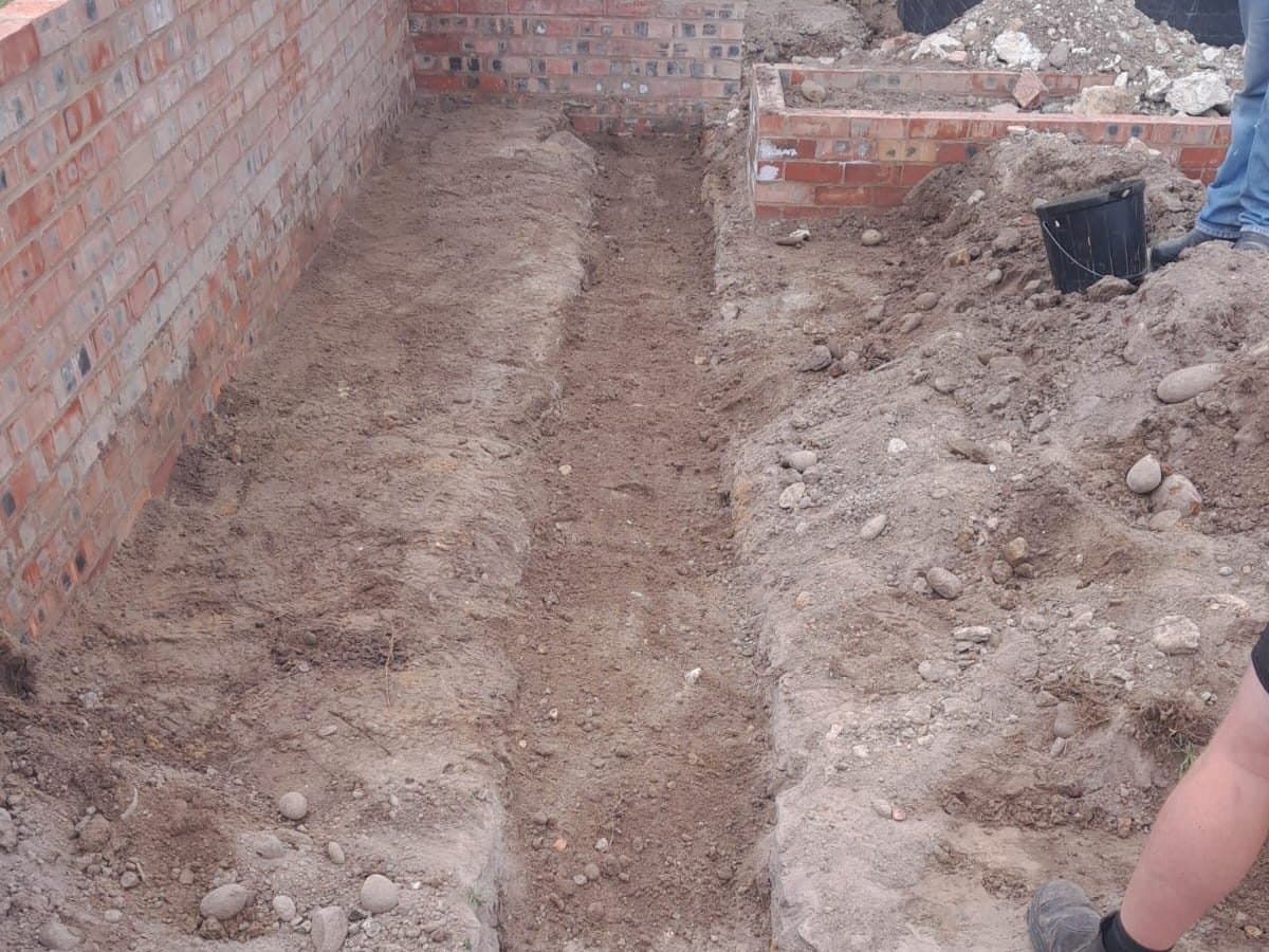 Completed excavation and surface repair