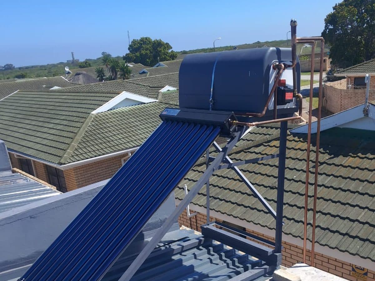 Solar geyser installation on a house roof
