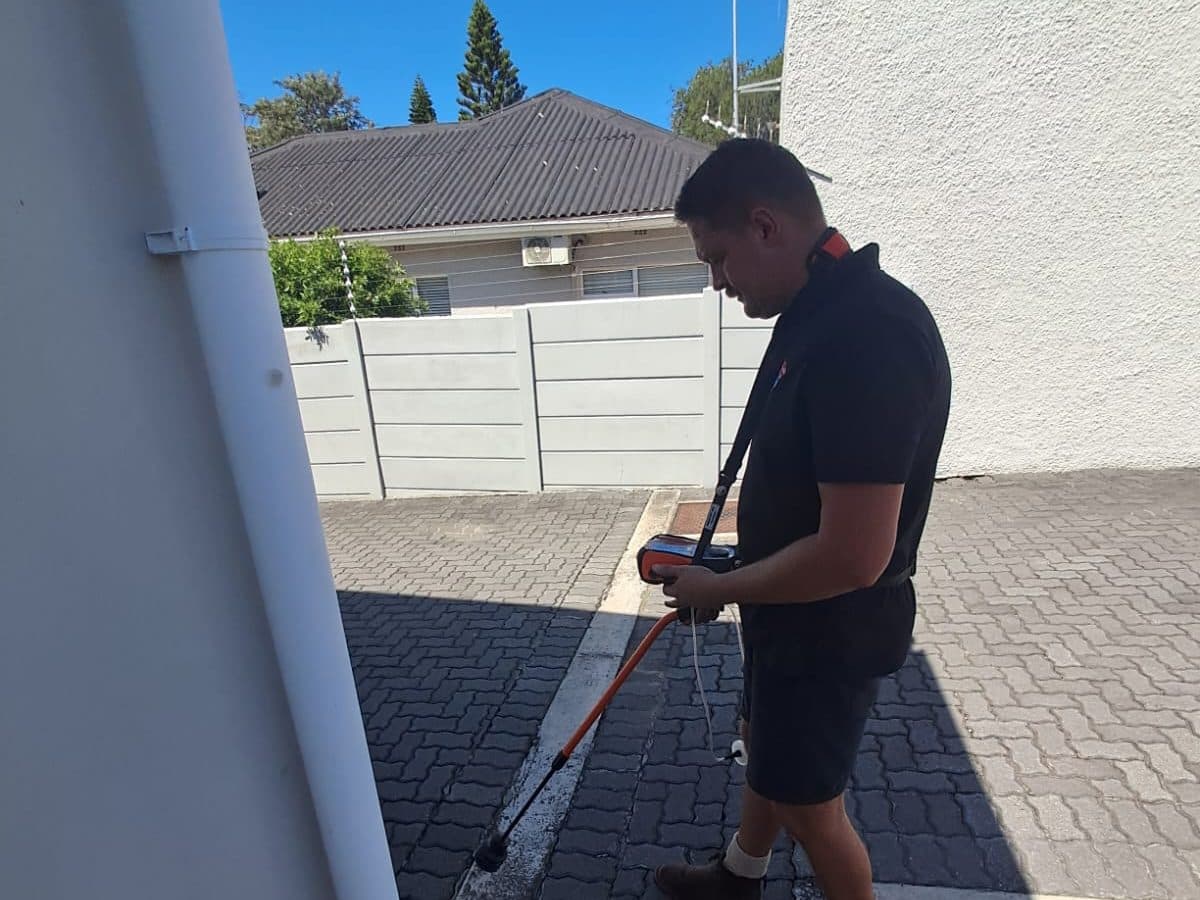 Leak detection work outside a house