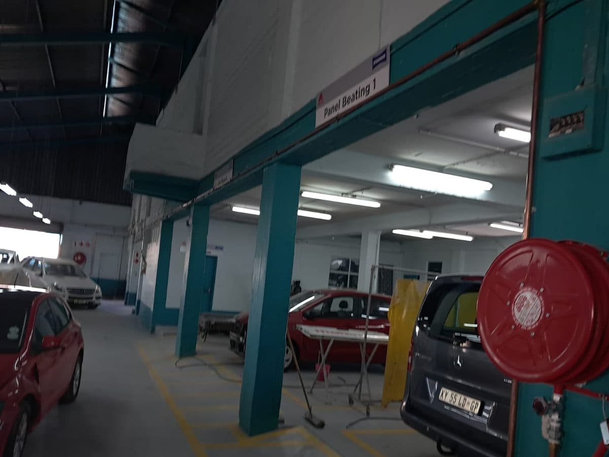 Fire hose reels fitted in a commercial workshop
