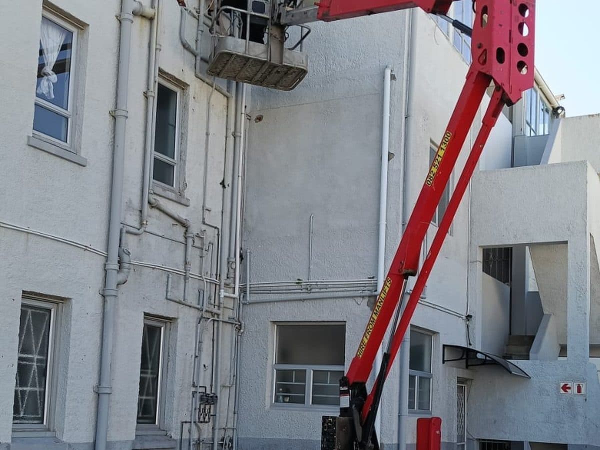 Height access platform in use at a block of flats