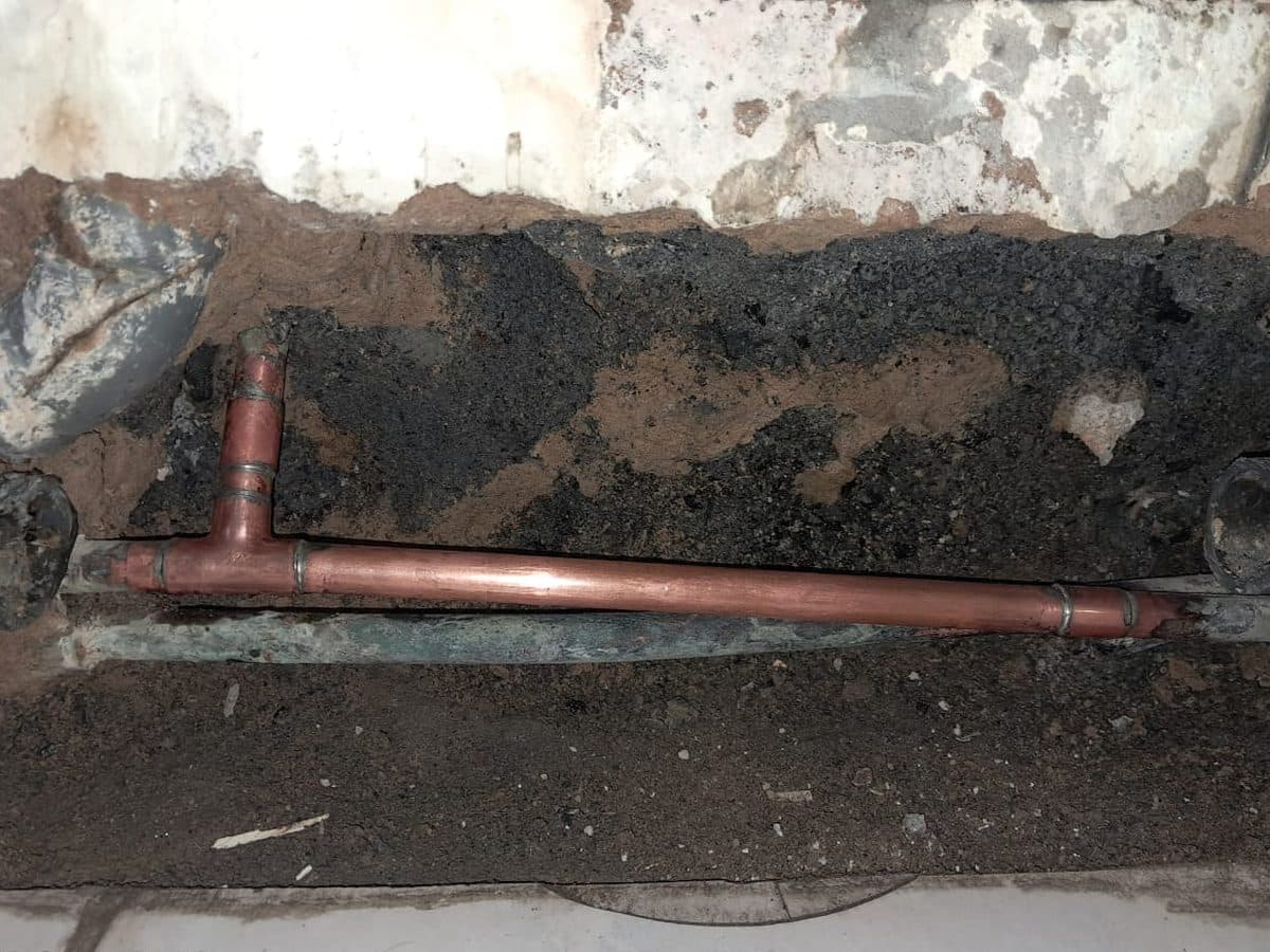 Copper pipe laid in an open trench