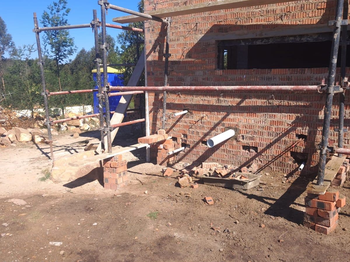 Construction site with pipework being installed