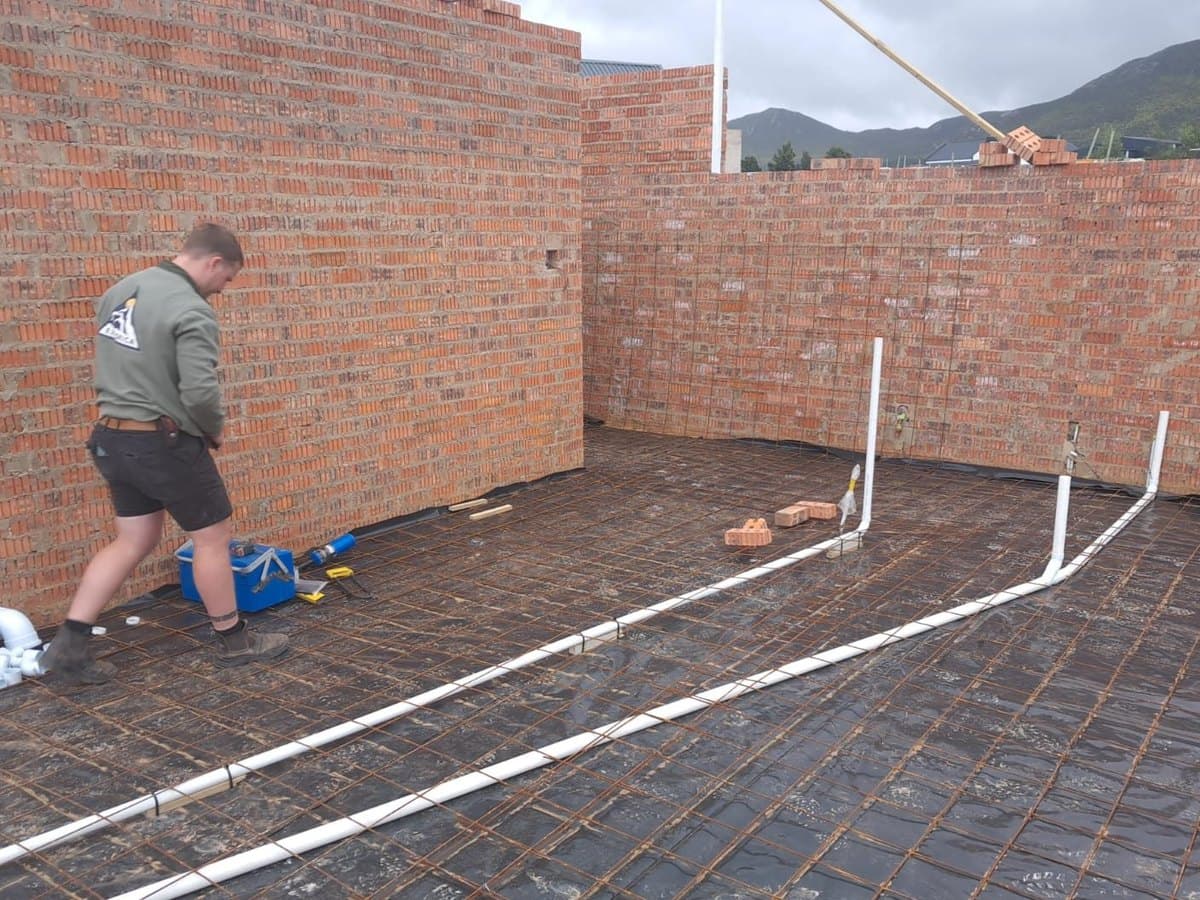 New drainage pipework laid under brick paving